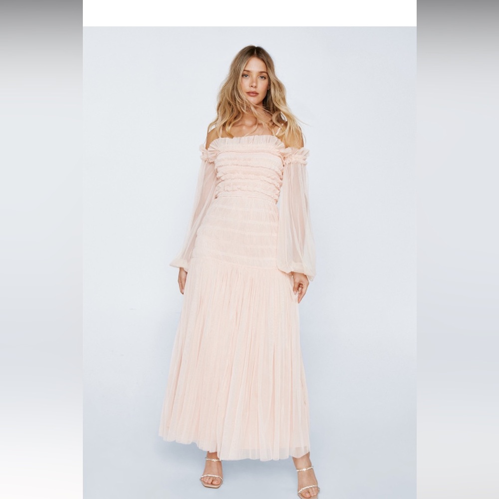 Nasty gal never won’t dress. Still in packaging. Missed my return date